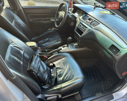 Серый Мицубиси Лансер, объемом двигателя 1.58 л и пробегом 244 тыс. км за 4950 $, фото 10 на Automoto.ua