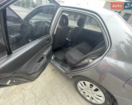 Сірий Міцубісі Lancer, об'ємом двигуна 1.58 л та пробігом 162 тис. км за 4650 $, фото 10 на Automoto.ua