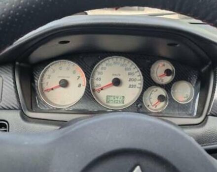 Серый Мицубиси Лансер, объемом двигателя 1.58 л и пробегом 271 тыс. км за 4600 $, фото 4 на Automoto.ua