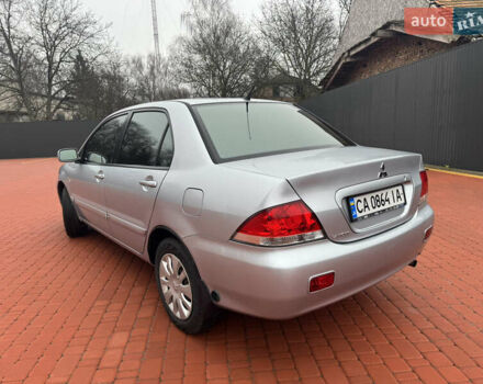 Серый Мицубиси Лансер, объемом двигателя 1.6 л и пробегом 242 тыс. км за 4300 $, фото 4 на Automoto.ua