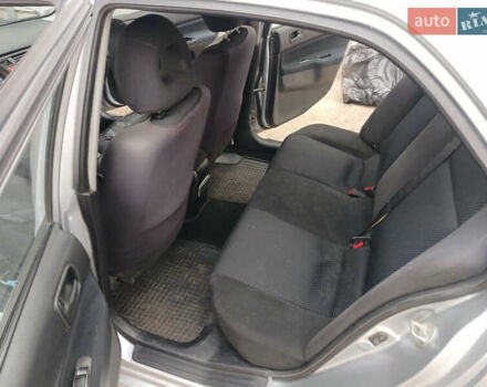 Серый Мицубиси Лансер, объемом двигателя 1.58 л и пробегом 215 тыс. км за 4000 $, фото 13 на Automoto.ua