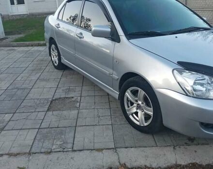 Мицубиси Лансер 2006 в Каменское - Днепродзержинск на Automoto.ua Серый Мицубиси Лансер, объемом двигателя 1.58 л и пробегом 238 тыс. км за 5400 $, фото 4 на Automoto.ua