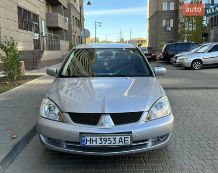 Серый Мицубиси Лансер, объемом двигателя 1.58 л и пробегом 244 тыс. км за 4950 $, фото 3 на Automoto.ua