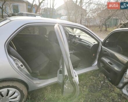 Серый Мицубиси Лансер, объемом двигателя 1.6 л и пробегом 234 тыс. км за 4300 $, фото 3 на Automoto.ua