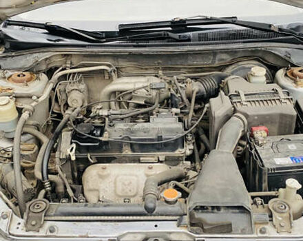 Серый Мицубиси Лансер, объемом двигателя 1.6 л и пробегом 253 тыс. км за 2850 $, фото 18 на Automoto.ua