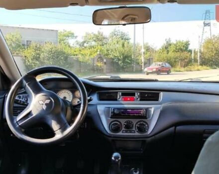 Сірий Міцубісі Lancer, об'ємом двигуна 1.6 л та пробігом 229 тис. км за 4900 $, фото 11 на Automoto.ua