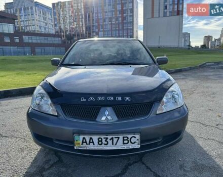 Сірий Міцубісі Lancer, об'ємом двигуна 1.58 л та пробігом 276 тис. км за 3650 $, фото 5 на Automoto.ua