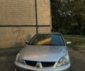 Сірий Міцубісі Lancer, об'ємом двигуна 1.6 л та пробігом 225 тис. км за 4700 $, фото 1 на Automoto.ua