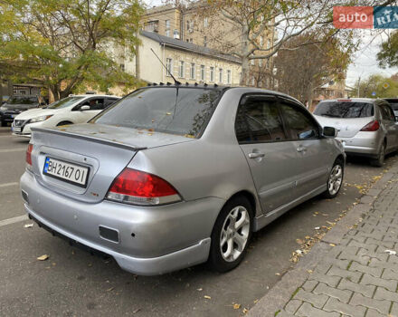 Серый Мицубиси Лансер, объемом двигателя 1.6 л и пробегом 444 тыс. км за 3400 $, фото 5 на Automoto.ua