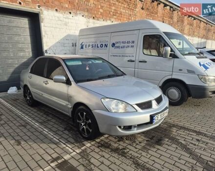 Серый Мицубиси Лансер, объемом двигателя 1.58 л и пробегом 301 тыс. км за 3500 $, фото 2 на Automoto.ua