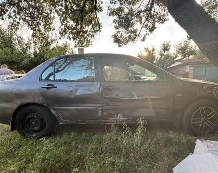 Сірий Міцубісі Lancer, об'ємом двигуна 0 л та пробігом 3 тис. км за 1800 $, фото 3 на Automoto.ua