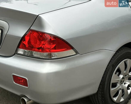 Серый Мицубиси Лансер, объемом двигателя 1.58 л и пробегом 183 тыс. км за 4800 $, фото 12 на Automoto.ua