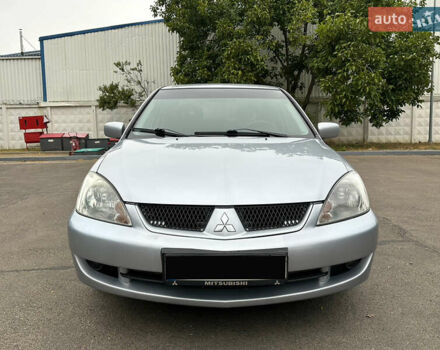 Серый Мицубиси Лансер, объемом двигателя 1.58 л и пробегом 183 тыс. км за 4800 $, фото 3 на Automoto.ua