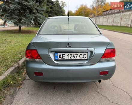 Серый Мицубиси Лансер, объемом двигателя 1.58 л и пробегом 260 тыс. км за 4050 $, фото 2 на Automoto.ua