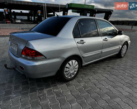 Сірий Міцубісі Lancer, об'ємом двигуна 1.58 л та пробігом 333 тис. км за 2700 $, фото 3 на Automoto.ua