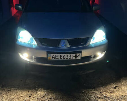 Сірий Міцубісі Lancer, об'ємом двигуна 1.58 л та пробігом 197 тис. км за 3450 $, фото 11 на Automoto.ua