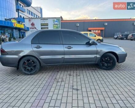 Серый Мицубиси Лансер, объемом двигателя 1.6 л и пробегом 279 тыс. км за 3990 $, фото 2 на Automoto.ua