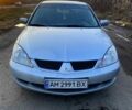 Сірий Міцубісі Lancer, об'ємом двигуна 1.6 л та пробігом 245 тис. км за 4200 $, фото 1 на Automoto.ua