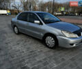 Сірий Міцубісі Lancer, об'ємом двигуна 1.58 л та пробігом 333 тис. км за 2999 $, фото 2 на Automoto.ua