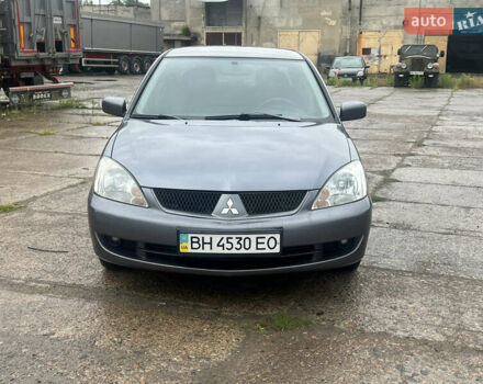 Серый Мицубиси Лансер, объемом двигателя 1.6 л и пробегом 193 тыс. км за 4700 $, фото 2 на Automoto.ua