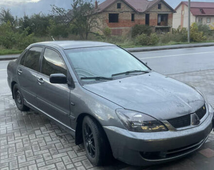 Сірий Міцубісі Lancer, об'ємом двигуна 1.6 л та пробігом 244 тис. км за 2999 $, фото 2 на Automoto.ua