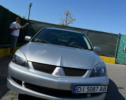 Сірий Міцубісі Lancer, об'ємом двигуна 1.84 л та пробігом 190 тис. км за 3500 $, фото 3 на Automoto.ua