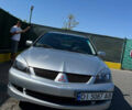 Сірий Міцубісі Lancer, об'ємом двигуна 1.84 л та пробігом 190 тис. км за 3500 $, фото 3 на Automoto.ua