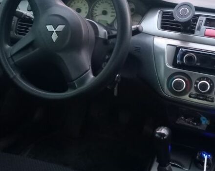 Серый Мицубиси Лансер, объемом двигателя 1.6 л и пробегом 270 тыс. км за 3700 $, фото 6 на Automoto.ua