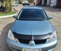 Сірий Міцубісі Lancer, об'ємом двигуна 1.6 л та пробігом 212 тис. км за 4700 $, фото 13 на Automoto.ua