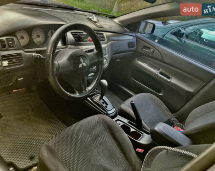 Сірий Міцубісі Lancer, об'ємом двигуна 1.6 л та пробігом 222 тис. км за 4900 $, фото 7 на Automoto.ua