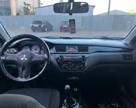 Серый Мицубиси Лансер, объемом двигателя 1.6 л и пробегом 279 тыс. км за 3990 $, фото 6 на Automoto.ua