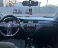 Серый Мицубиси Лансер, объемом двигателя 1.6 л и пробегом 279 тыс. км за 3990 $, фото 6 на Automoto.ua