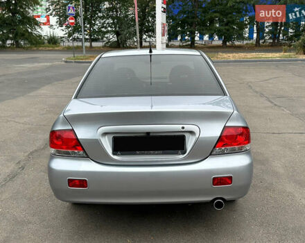 Серый Мицубиси Лансер, объемом двигателя 1.58 л и пробегом 183 тыс. км за 4800 $, фото 10 на Automoto.ua