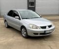Сірий Міцубісі Lancer, об'ємом двигуна 1.6 л та пробігом 220 тис. км за 2450 $, фото 1 на Automoto.ua