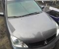 Сірий Міцубісі Lancer, об'ємом двигуна 1.6 л та пробігом 202 тис. км за 3300 $, фото 1 на Automoto.ua