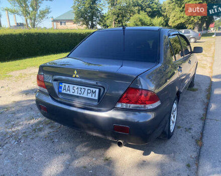 Серый Мицубиси Лансер, объемом двигателя 1.6 л и пробегом 291 тыс. км за 3900 $, фото 2 на Automoto.ua