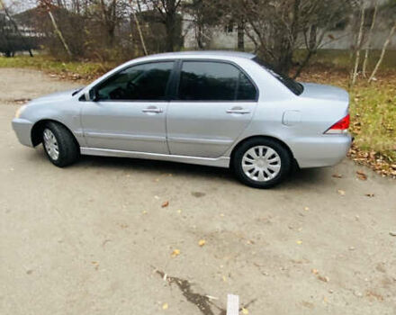 Серый Мицубиси Лансер, объемом двигателя 1.6 л и пробегом 253 тыс. км за 2850 $, фото 3 на Automoto.ua