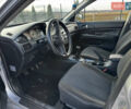 Сірий Міцубісі Lancer, об'ємом двигуна 1.58 л та пробігом 333 тис. км за 2700 $, фото 9 на Automoto.ua