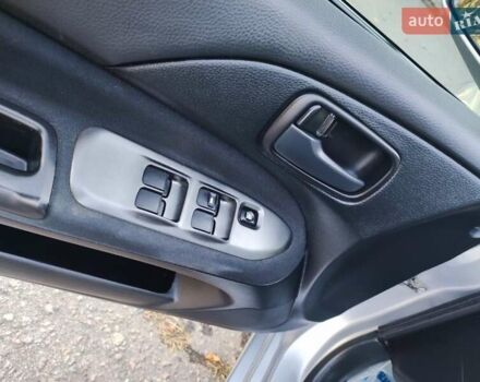 Сірий Міцубісі Lancer, об'ємом двигуна 1.58 л та пробігом 122 тис. км за 6300 $, фото 43 на Automoto.ua