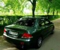 Сірий Міцубісі Lancer, об'ємом двигуна 1.58 л та пробігом 220 тис. км за 4500 $, фото 1 на Automoto.ua