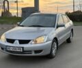 Сірий Міцубісі Lancer, об'ємом двигуна 1.6 л та пробігом 320 тис. км за 3950 $, фото 1 на Automoto.ua