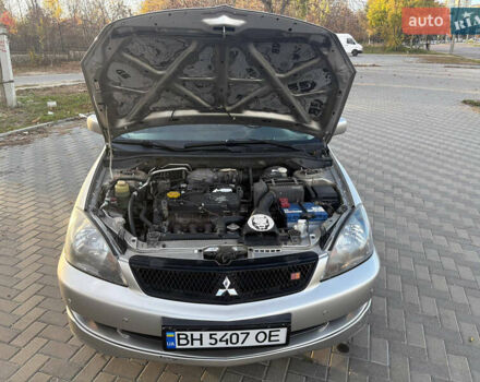 Серый Мицубиси Лансер, объемом двигателя 2 л и пробегом 184 тыс. км за 4900 $, фото 9 на Automoto.ua