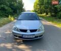 Сірий Міцубісі Lancer, об'ємом двигуна 1.6 л та пробігом 193 тис. км за 5750 $, фото 1 на Automoto.ua