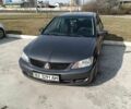 Сірий Міцубісі Lancer, об'ємом двигуна 1.6 л та пробігом 188 тис. км за 160000 $, фото 1 на Automoto.ua
