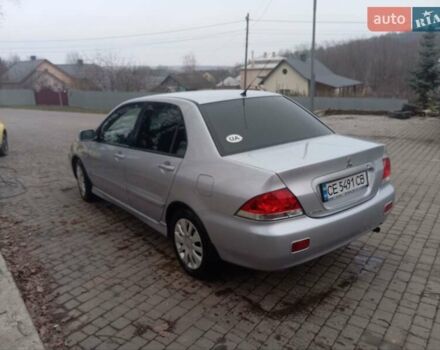 Серый Мицубиси Лансер, объемом двигателя 1.6 л и пробегом 175 тыс. км за 4200 $, фото 11 на Automoto.ua