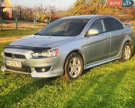 Серый Мицубиси Лансер, объемом двигателя 2 л и пробегом 226 тыс. км за 6200 $, фото 3 на Automoto.ua