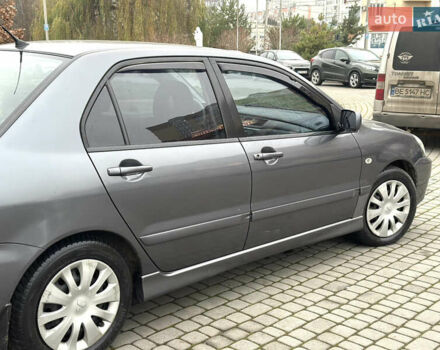 Сірий Міцубісі Lancer, об'ємом двигуна 1.6 л та пробігом 177 тис. км за 2800 $, фото 9 на Automoto.ua