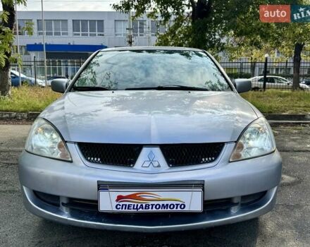 Сірий Міцубісі Lancer, об'ємом двигуна 1.58 л та пробігом 138 тис. км за 4990 $, фото 7 на Automoto.ua