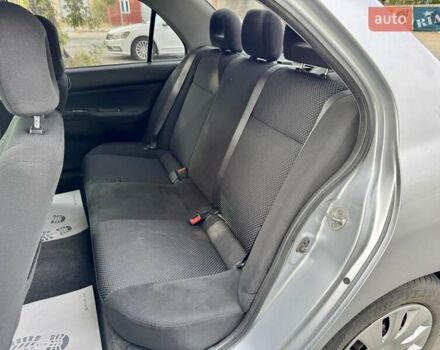 Сірий Міцубісі Lancer, об'ємом двигуна 1.58 л та пробігом 138 тис. км за 4990 $, фото 17 на Automoto.ua