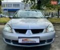 Сірий Міцубісі Lancer, об'ємом двигуна 1.58 л та пробігом 138 тис. км за 4990 $, фото 7 на Automoto.ua